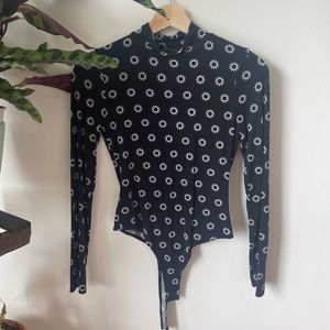 Black & white print long sleeve one piece